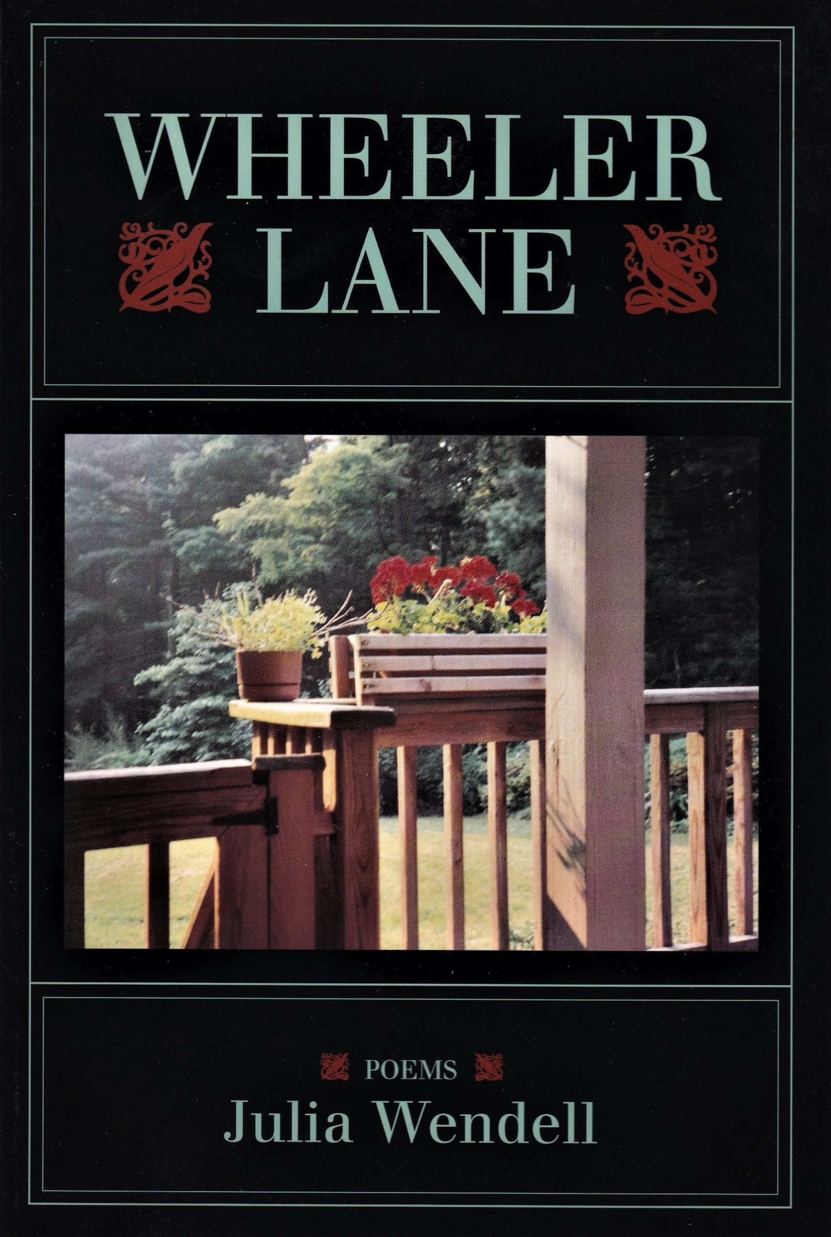 Book cover of *Wheeler Lane, Poems* by Julia Wendell (1998), featuring a wooden deck with potted plants and a view of greenery in the background.
